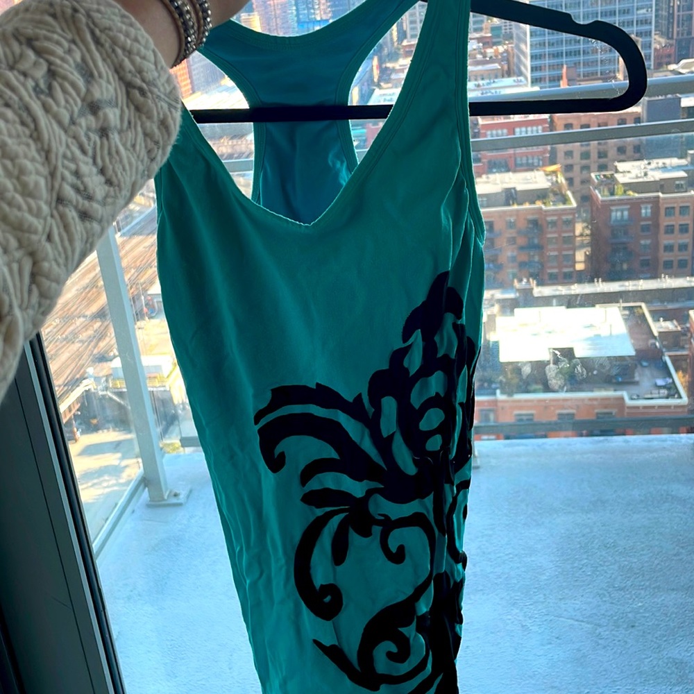 Aqua blue top with black chandelier design
